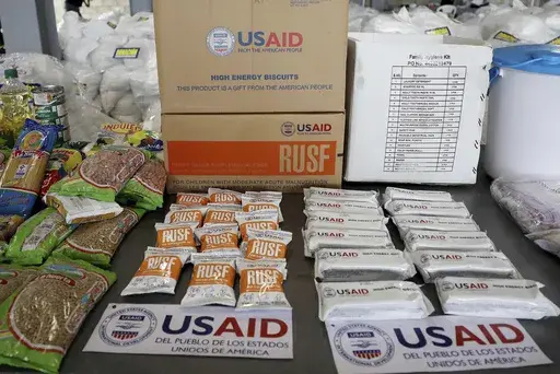 USAID humanitarian aid destined for Venezuela is displayed for the media at a warehouse next to the Tienditas International Bridge on the outskirts of Cucuta, Colombia, Feb. 19, 2019. (AP Photo/Fernando Vergara, File)