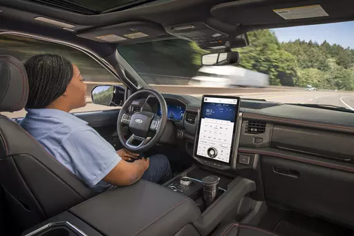 This photo provided by Ford shows the BlueCruise driver system, which gives the driver the option to go hands-free when certain conditions are met. (Courtesy of Ford Motor Co. via AP)