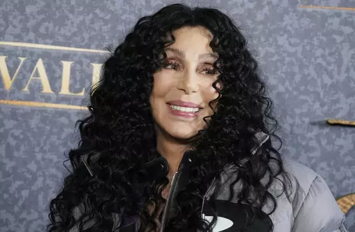 Cher arrives at the premiere of "Chevalier" in Los Angeles on rApril 16, 2023. Cher's holiday album, “Christmas,” releases Friday. (Photo by Jordan Strauss/Invision/AP, Filer)