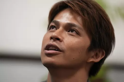 Kazuya Nakamura, a former singer and dancer for Japanese entertainment company Johnny & Associates, speaks during an interview with The Associated Press in Tokyo, Monday, July 3, 2023. Nakamura, who claims he was sexually assaulted by the now deceased founder of Johnny’s, Johnny Kitagawa, said he’s still waiting for Japanese society to recognize what happened to him . (AP Photo/Hiro Komae)