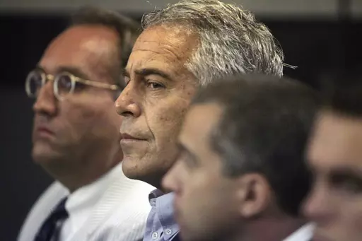 Jeffrey Epstein appears in court, July 30, 2008, in West Palm Beach, Fla. After dozens of previously sealed court documents related to financier Epstein were made public Wednesday, Jan. 3, 2024, social media users began spreading false accusations about major public figures named in the release — and some who hadn’t been named at all. (Uma Sanghvi/The Palm Beach Post via AP, File)