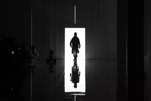 A model wears a creation as part of the men's Dsquared2 Fall-Winter 2024-2025 collection, that was presented in Milan, Italy, Friday, Jan. 12, 2024. (AP Photo/Antonio Calanni).