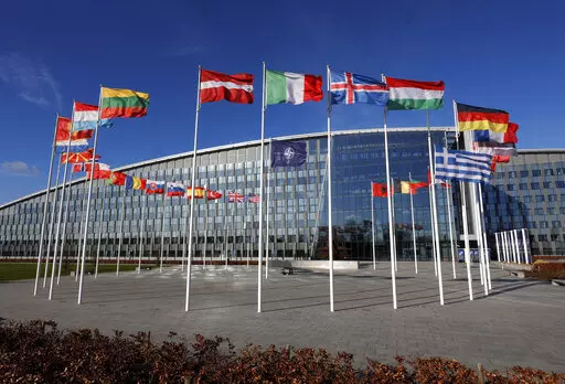 Flags flutter in the wind outside NATO headquarters in Brussels, Feb. 7, 2022. With Finland and Sweden taking steps to join NATO, the list of “neutral” countries in Europe appears poised to shrink. Security concerns over Russia’s ongoing invasion of Ukraine changed the calculus for Finland and Sweden which have long espoused neutrality and caused other traditionally “neutral” countries to re-think what that term really means for them. (AP Photo/Olivier Matthys, File)