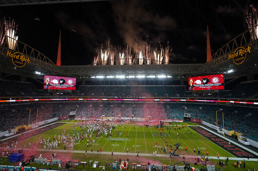 Alabama celebrates after their win against Ohio State in an NCAA College Football Playoff national championship game, Monday, Jan. 11, 2021, in Miami Gardens, Fla. College football and men's basketball players on scholarship in one of the major conferences can expect to soon earn a minimum of $50,000 each year he plays because of the influx of cash from so-called booster collectives brokering name, image and likeness deals.That prediction, based on market trends, was made this week by Blake Lawr