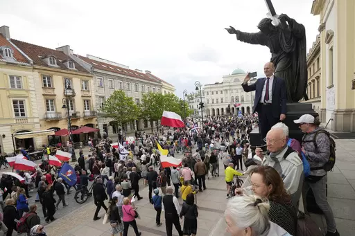 Anti-abortion demonstrators march in support of every conceived life and against steps taken by the new government to liberalize Poland's strict law and allow termination of pregnancy until the 12th week, in Warsaw, Poland, on Sunday, April 14, 2024. Last week, Poland's parliament, which is dominated by the liberal and pro-European Union ruling coalition, voted to approve further detailed work on four proposals to lift the near-ban on abortions. (AP Photo/Czarek Sokolowski)