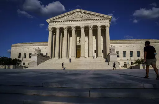 In this Friday, Sept. 3, 2021 photo, the Supreme Court is shown in Washington. The Supreme Court plans to return to in-person arguments in October, but no public allowed. (AP Photo/J. Scott Applewhite)