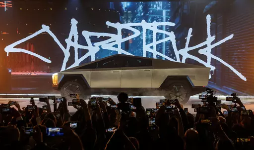 The Tesla Cybertruck is unveiled at Tesla's design studio Thursday, Nov. 21, 2019, in Hawthorne, Calif. On Saturday, July 15, 2023, Tesla said its first production Cybertruck electric pickup has rolled off the assembly line in Texas, nearly two years behind the original schedule. (AP Photo/Ringo H.W. Chiu, File)