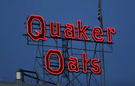 The Quaker Oats sign is seen in Cedar Rapids, Iowa on Tuesday, June 8, 2021. The Quaker Oats Company has expanded a December recall of more than 40 products that may be contaminated with salmonella to include two dozen additional types of granola bars, cereals and snack foods, Friday, Jan. 12, 2023. (Rebecca F. Miller/The Gazette via AP, File)