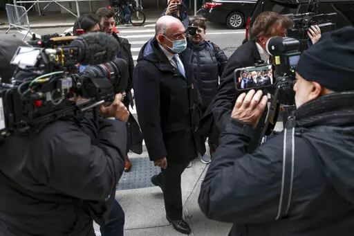 Trump Organization's former Chief Financial Officer Allen Weisselberg, center, arrives to court on Nov. 15, 2022, in New York. Closing arguments are slated for Thursday, Dec. 1, in Donald Trump's company’s criminal tax fraud case. Prosecutors and defense lawyers say those could take seven hours or more. Those projections speak to the complexity of the case, which stems from longtime Trump Organization finance chief Weisselberg's 15-year scheme to avoid taxes on company-paid perks including an 