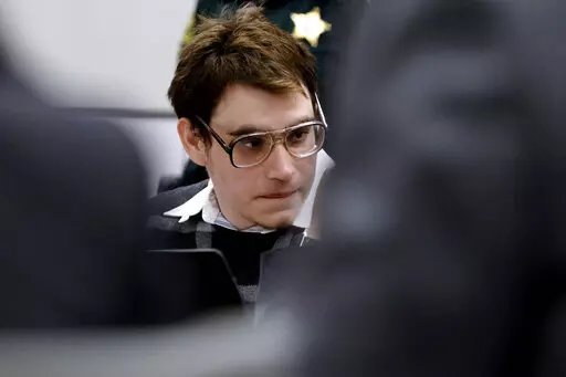 Marjory Stoneman Douglas High School shooter Nikolas Cruz is shown at the defense table just before his defense team announced their intention to rest their case during the penalty phase of Cruz's trial at the Broward County Courthouse in Fort Lauderdale on Wednesday, Sept. 14, 2022. Cruz previously plead guilty to all 17 counts of premeditated murder and 17 counts of attempted murder in the 2018 shootings. (Amy Beth Bennett/South Florida Sun Sentinel via AP, Pool)