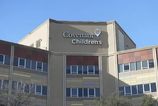 Covenant Children's Hospital is pictured from outside the emergency entrance on Wednesday, Feb. 26, 2025, in Lubbock, Texas. (AP Photo/Mary Conlon)
