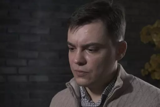 In this image from video provided by the Dossier Center, a London-based investigative group funded by Russian opposition figure Mikhail Khodorkovsky, Gleb Karakulov speaks during an interview in Turkey in December 2022. Karakulov was an officer in President Vladimir Putin’s secretive elite personal security service - one of the few Russians to flee and go public who have rank, as well as knowledge of intimate details of Putin’s life and potentially classified information. (Dossier Center via