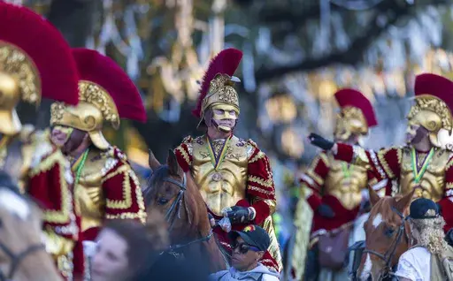 The Krewe of Bacchus rolls through the streets of New Orleans, Sunday, March 2, 2025. (Chris Granger/The Times-Picayune/The New Orleans Advocate via AP)
