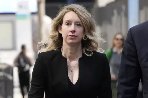 Former Theranos CEO Elizabeth Holmes leaves federal court in San Jose, Calif., March 17, 2023. On Monday, April 10, Holmes was rebuffed in her attempt to stay out of federal prison while she appeals her conviction for the fraud she committed while overseeing a blood-testing scam that exposed Silicon Valley’s dark side. (AP Photo/Jeff Chiu, File)