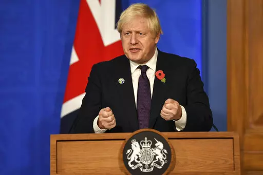 Britain's Prime Minister Boris Johnson during a press conference in Downing Street, London, Sunday, Nov. 14, 2021 about the Cop26 climate summit. (Daniel Leal/Pool photo via AP)