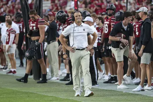 South Carolina head coach Shane Beamer reacts after his offensive momentum is slowed down by another Mississippi injury during the second half of an NCAA college football game Saturday, Oct. 5, 2024, in Columbia, S.C. (AP Photo/Artie Walker Jr.)