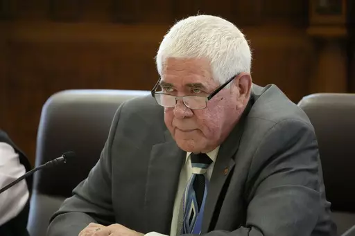 Mississippi State Senate Medicaid Committee Chairman Kevin Blackwell, R-Southaven, entertains questions from committee members on a proposal to expand Medicaid benefits to tens of thousands of residents, during its meeting, Wednesday, March 27, 2024, in the Mississippi State Capitol. However, the senate proposal would cover fewer people than the House version. (AP Photo/Rogelio V. Solis)