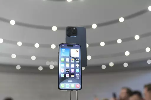 The iPhone 15 Pro is displayed during an announcement of new products on the Apple campus, Tuesday, Sept. 12, 2023, in Cupertino, Calif. (AP Photo/Jeff Chiu)