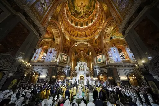 Russian Orthodox Patriarch Kirill, center, delivers the Christmas service in the Christ the Saviour Cathedral in Moscow, Russia, Friday, Jan. 6, 2023. While much of the world has Christmas in the rearview mirror by now, people in some Eastern Orthodox traditions will celebrating the holy day on Sunday. Jan. 7, 2024. (AP Photo/Alexander Zemlianichenko, Pool, File)