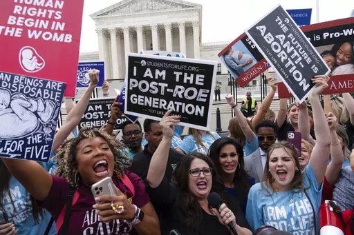 Demonstrators gather outside the Supreme Court in Washington, Friday, June 24, 2022. The Supreme Court has ended constitutional protections for abortion that had been in place nearly 50 years, a decision by its conservative majority to overturn the court's landmark abortion cases. (AP Photo/Jose Luis Magana)