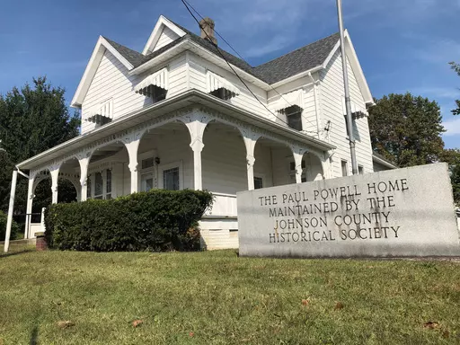 A sign marks he Paul Powell Home and Museum, Oct. 8, 2020 photo in Vienna, Ill. For more than half a century, a Powell-established $250,000 trust sustained his legacy, for better or worse. But the account that maintained his birthplace as a museum will soon run dry. (AP Photo/John O'Connor, File)