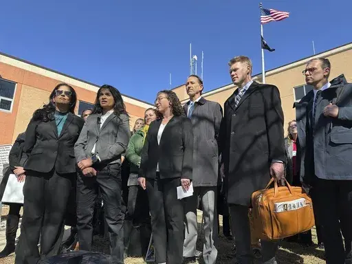 Greenpeace representatives talk with reporters on Wednesday, March 19, 2025, outside the Morton County Courthouse in Mandan, N.D. From left are Greenpeace USA Interim Executive Director Sushma Raman, Greenpeace USA Senior Legal Adviser Deepa Padmanabha, Greenpeace International General Counsel Kristin Casper, Greenpeace USA attorney Everett Jack Jr., Greenpeace Fund Inc. attorney Matt Kelly and Greenpeace USA Associate General Counsel Jay Meisel. (AP Photo/Jack Dura)