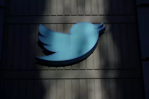 A sign at Twitter headquarters is shown in San Francisco, Friday, Nov. 18, 2022. Election falsehoods are thriving on Twitter after former President Donald Trump dug in on these claims at a CNN town hall, despite Twitter owner Elon Musk's insistence that false stolen-election claims on the platform “will be corrected.” An analysis shows the 10 most widely shared tweets promoting a “rigged election” narrative in the five days after the town hall have not been labeled or removed. (AP Photo/