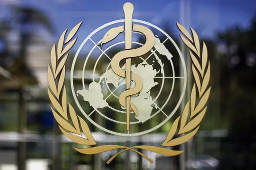 In this June 11, 2009, file photo, the logo of the World Health Organization is seen at the WHO headquarters in Geneva, Switzerland. On Friday, March 3, 2023, The Associated Press reported on stories circulating online incorrectly claiming a legally-binding World Health Organization “pandemic treaty” will give the organization the authority to control U.S. policies during a pandemic, including those on vaccines, lockdowns, school closures and more. (AP Photo/Anja Niedringhaus, File)