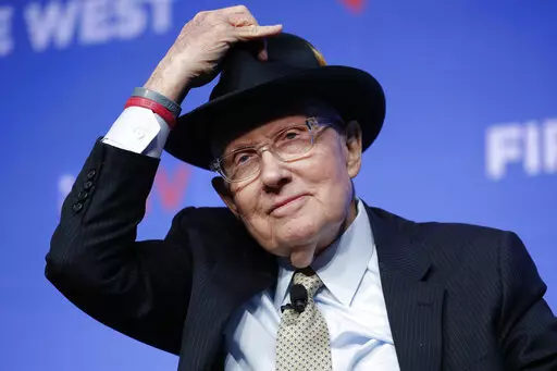 Former Senate Majority Leader Harry Reid tips his hat during a fundraiser for the Nevada Democratic Party in Las Vegas, Nov. 17, 2019. Reid, who was the Senate majority leader from 2007 to 2015, helped pool resources to maximize support for candidates up and down the ballot. Reid died on Dec. 28, 2021. (AP Photo/John Locher, File)