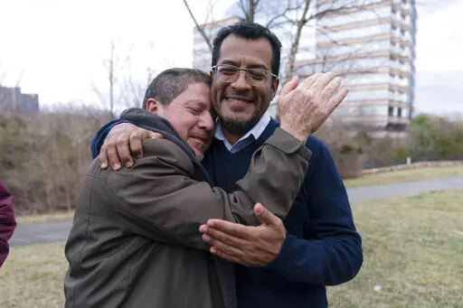 Nicaraguan opposition leader Felix Maradiaga is welcomed by a supporter in Chantilly, Va., Thursday, Feb. 9, 2023. Maradiaga was among some 222 prisoners of the government of Nicaraguan President Daniel Ortega who arrived from Nicaragua to the Washington Dulles International Airport on Thursday, after an apparently negotiated release. (AP Photo/Jose Luis Magana)