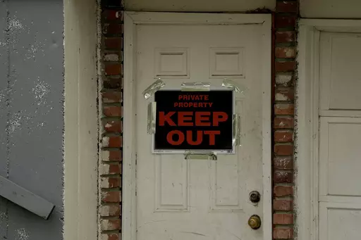 A keep out sign is posted on a home, Wednesday, April 19, 2023, near the house where 84-year-old Andrew Lester shot 16-year-old Ralph Yarl a week earlier in Kansas City, Mo. (AP Photo/Charlie Riedel, File)