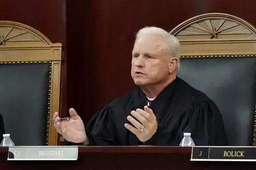 Arizona Supreme Court Chief Justice Robert M. Brutinel speaks during oral arguments, in Phoenix on April 20, 2021. Arizona victims of long-ago child sex abuse can proceed with lawsuits against groups like the Boy Scouts of America following a recent decision by the state Supreme Court that rejected claims that a 2019 state law extending victims' right to sue was unconstitutional. (AP Photo/Matt York, File)