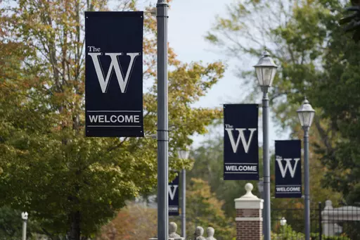 Mississippi University for Women banners decorate the Columbus, Miss., campus, Oct. 23, 2023. The university announced a proposal Monday, Jan. 8, 2024, to change its name to Mississippi Brightwell University, with officials saying the new name is supposed to reflect the diversity of the public institution that has been enrolling men since 1982. (AP Photo/Rogelio V. Solis)