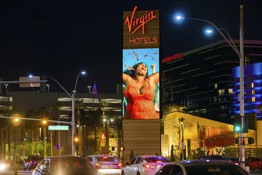 Virgin Hotels Las Vegas is illuminated on Wednesday, March 24, 2021, in Las Vegas. (Benjamin Hager/Las Vegas Review-Journal via AP, File)