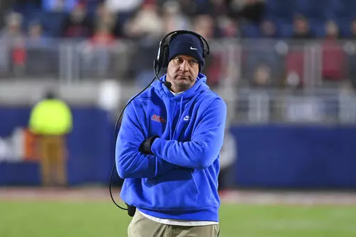 Mississippi head coach Lane Kiffin watches on during the second half of an NCAA college football game against Vanderbilt in Oxford, Miss., Saturday, Nov. 20, 2021. No. 10 Mississippi won 31-17. (AP Photo/Thomas Graning)