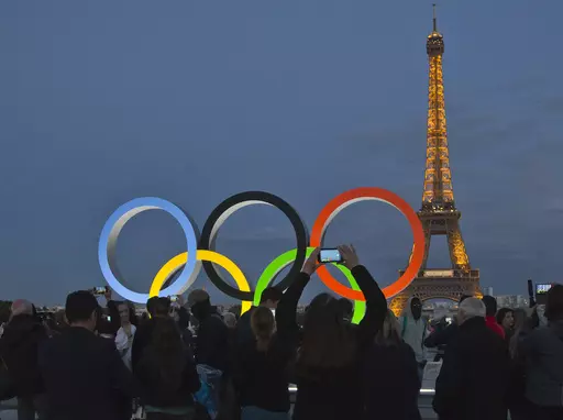 The Olympic rings are set up on Trocadero plaza that overlooks the Eiffel Tower, a day after the official announcement that the 2024 Summer Olympic Games will be in the French capital, in Paris, Thursday, Sept. 14, 2017. The organizers of the Paris Games say the Olympic rings will be displayed on the Eiffel Tower. The five-ring creation is 29-meters long and 15-meter high, made entirely of recycled steel, the Games organizers said in a statement Monday April, 8, 2024. (AP Photo//Michel Euler, Fi