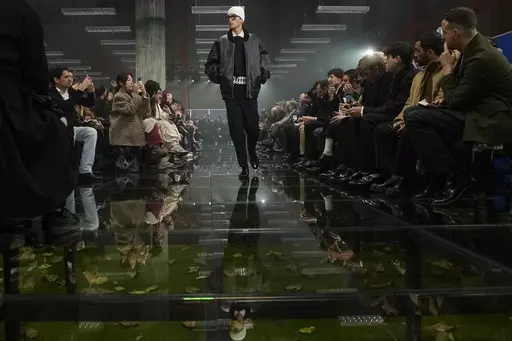 A model wears a creation part of the men's Prada Fall-Winter 2024-2025 collection, that was presented in Milan, Italy, Sunday, Jan. 14, 2024. (AP Photo/Luca Bruno).