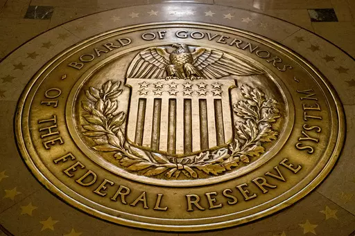 The seal of the Board of Governors of the United States Federal Reserve System is displayed in the ground at the Marriner S. Eccles Federal Reserve Board Building in Washington, Feb. 5, 2018. On Friday, April 14, 2023, The Associated Press reported on stories circulating online incorrectly claiming that a new Federal Reserve digital app, FedNow, will eliminate physical cash. (AP Photo/Andrew Harnik, File)