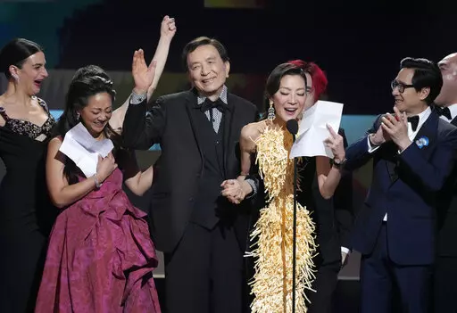 Jenny Slate, from left, Stephanie Hsu, James Hong, Michelle Yeoh, and Ke Huy Quan accept the award for outstanding performance by a cast in a motion picture for "Everything Everywhere All at Once" at the 29th annual Screen Actors Guild Awards on Sunday, Feb. 26, 2023, at the Fairmont Century Plaza in Los Angeles. (AP Photo/Chris Pizzello)