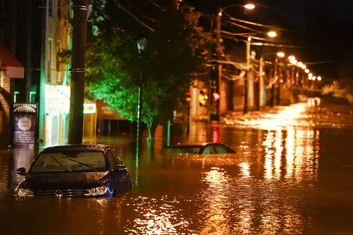 The Manayunk neighborhood in Philadelphia is flooded Thursday, Sept. 2, 2021, in the aftermath of downpours and high winds from the remnants of Hurricane Ida. La Nina, the natural but potent weather event linked to more drought and wildfires in the western United States and more Atlantic hurricanes, is becoming the nation’s unwanted weather guest and meteorologists said the West’s megadrought won’t go away until La Nina does. (AP Photo/Matt Rourke, File)