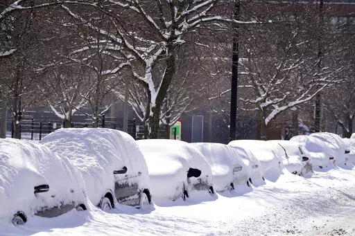 Cars parked for several days Tuesday, Feb. 16, 2021, are covered in cumulative snow in Chicago, the morning after a snowstorm dumped up to 18 inches in the greater Chicago area. Storing a vehicle because it’s not needed is something that an owner might have to do at some point. It might be because it’s a sports car that the owner wants to protect from wintertime driving, or perhaps a vehicle that won’t be driven for months because of a vacation or military deployment. Whatever the reason, 