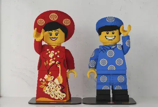 Lego characters in Vietnamese traditional costumes are displayed at Lego factory in Binh Duong, Vietnam Wednesday, April, 2, 2025. (AP Photo/Hau Dinh)