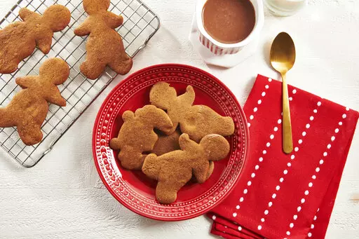 This Nov. 13, 2020 photo shows a display of gingerbread cookies in New York.  The holiday cookie swap is an evergreen tradition that lets you share sweetness, celebrate community and lighten the holiday baking load. (Cheyenne M. Cohen via AP)