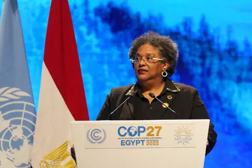 Mia Mottley, prime minister of Barbados, speaks at the COP27 U.N. Climate Summit, Nov. 8, 2022, in Sharm el-Sheikh, Egypt. The Barbados plan, dubbed the Bridgetown Initiative, could be a pathway to unlocking large sums of money from rich countries, which have contributed most to greenhouse gas emissions. Mottley first unveiled her idea at the COP26 meeting a year ago in Glasgow, Scotland, where she delivered a powerful speech and sketched out a rough plan to come up with new and innovative forms