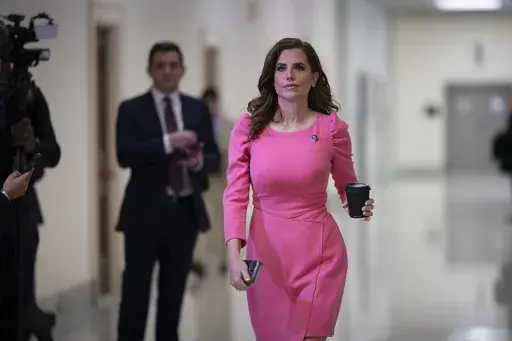 Rep. Nancy Mace, walks to join other members of the House Oversight Committee, Dec. 13, 2023, at the Capitol in Washington. Three Republican incumbent U.S. House members in South Carolina are facing primary challengers in 2024, including Mace, who is seeking a third term with the backing of Donald Trump. (AP Photo/J. Scott Applewhite, File)