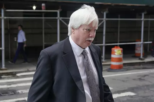 Trump Organization senior vice president and controller Jeffrey McConney returns to the courthouse after a break in the company's trial on Nov. 1, 2022, in New York. Former President Donald Trump has said he never thought his yearly financial statements “would be taken very seriously.” But evidence Thursday at his New York civil fraud trial showed the statements were integral to some of his business empire's loan deals. A state lawyer showed letters that former Trump company controller Jeffr