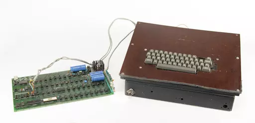 This photo provided by RR Auction shows a vintage Apple computer built in the 1970s and signed by company co-founder Steve Wozniak. It is being sold at auction in Boston. The Apple-1 set in motion the company that in June became the first publicly traded company to close a trading day with a $3 trillion market value. (Nikki Brickett/RR Auction via AP)