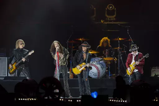 Tom Hamilton, from left, Steven Tyler, Joe Perry, John Douglas and Brad Whitford of Aerosmith, perform on Sept. 8, 2022, at Fenway Park in Boston. Aerosmith will be touring a city near you for the last time to celebrate their 50-plus years of being together. The Rock & Roll Hall of Fame band announced Monday, May 1, 2023 the dates for their farewell tour called “Peace Out” starting Sept. 2 in Philadelphia. (Photo by Winslow Townson/Invision/AP, file)
