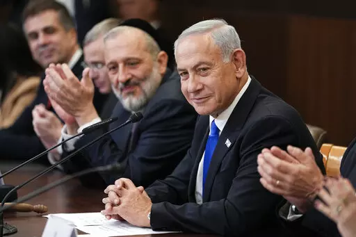 Newly sworn-in Israeli Prime Minister Benjamin Netanyahu attends a cabinet meeting in Jerusalem, Dec. 29, 2022. Netanyahu's new government is vexing the Biden administration as it embarks on policies that U.S. officials fear will run counter to longstanding American goals. (AP Photo/Ariel Schalit, Pool, File)