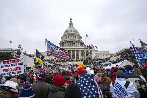 Insurrectionists loyal to President Donald Trump breach the U.S. Capitol in Washington on Jan. 6, 2021. A security operations leader for the far-right Oath Keepers group has been sentenced on Friday, July 21, 2023, to two years of probation. Michael Greene's acquittal on conspiracy charges in the Jan. 6, 2021, Capitol riot had marked a rare setback for prosecutors. (AP Photo/Jose Luis Magana, File)